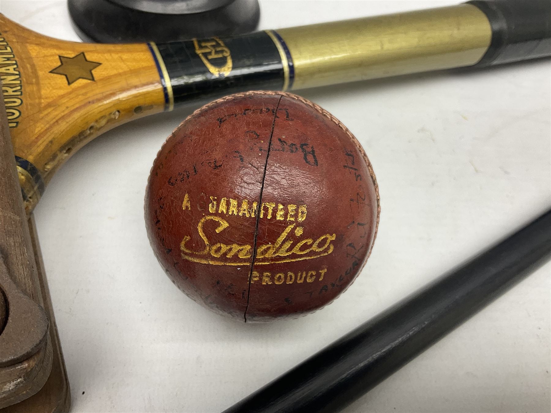 Walking cane, tennis racket, cricket ball (signed) and knight novelty cigarette lighter 