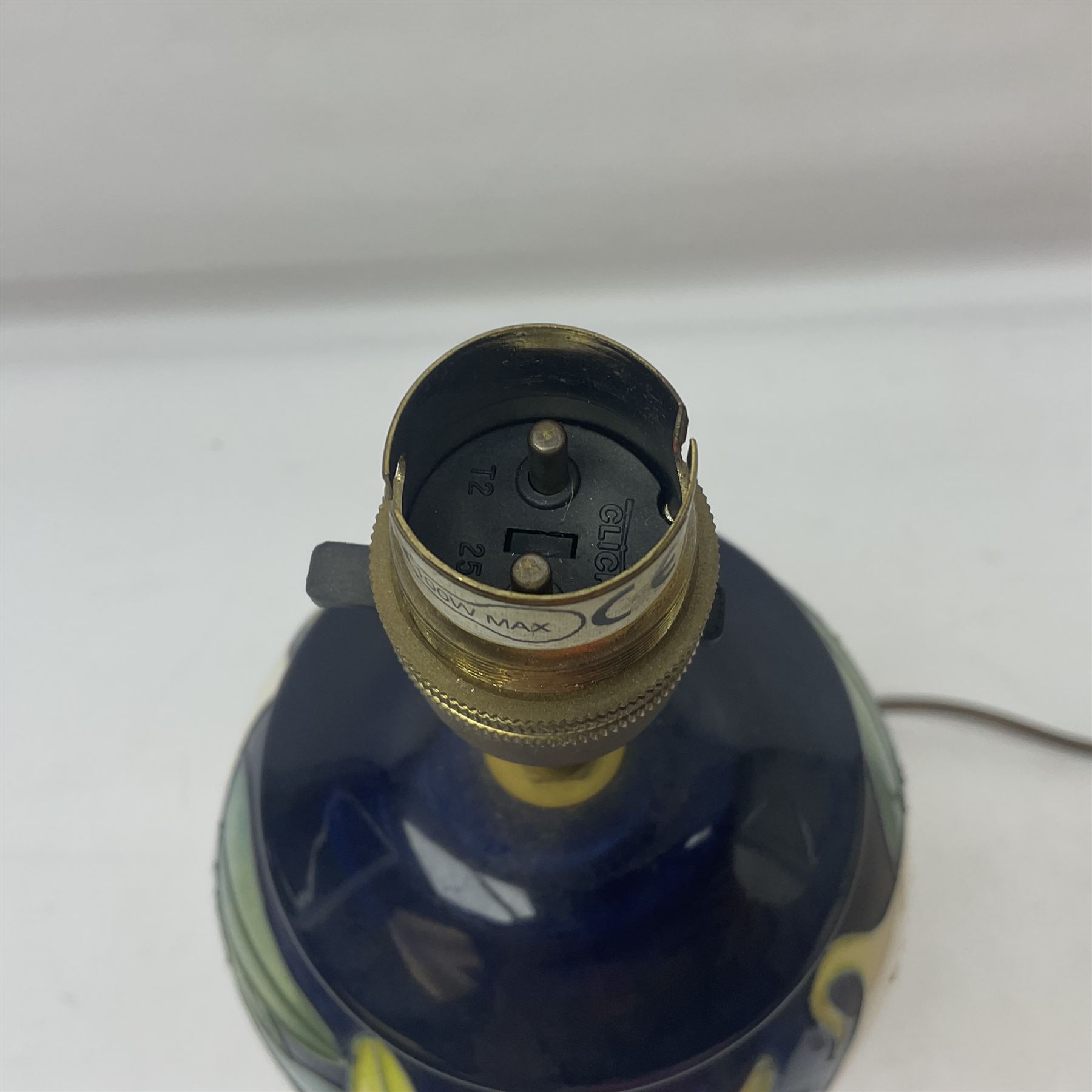 Moorcroft table lamp, Sesquipedale pattern of of baluster form, with shade  H21cm