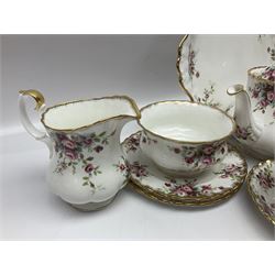 Royal Albert Cottage Garden pattern tea service for six people, comprising teapot, milk jug, sugar bowl, teacups and saucers, side plates and cake plate, all with printed mark beneath
