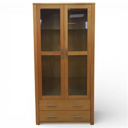 Solid light oak bookcase display cabinet, fitted with two glazed cupboards and two drawers