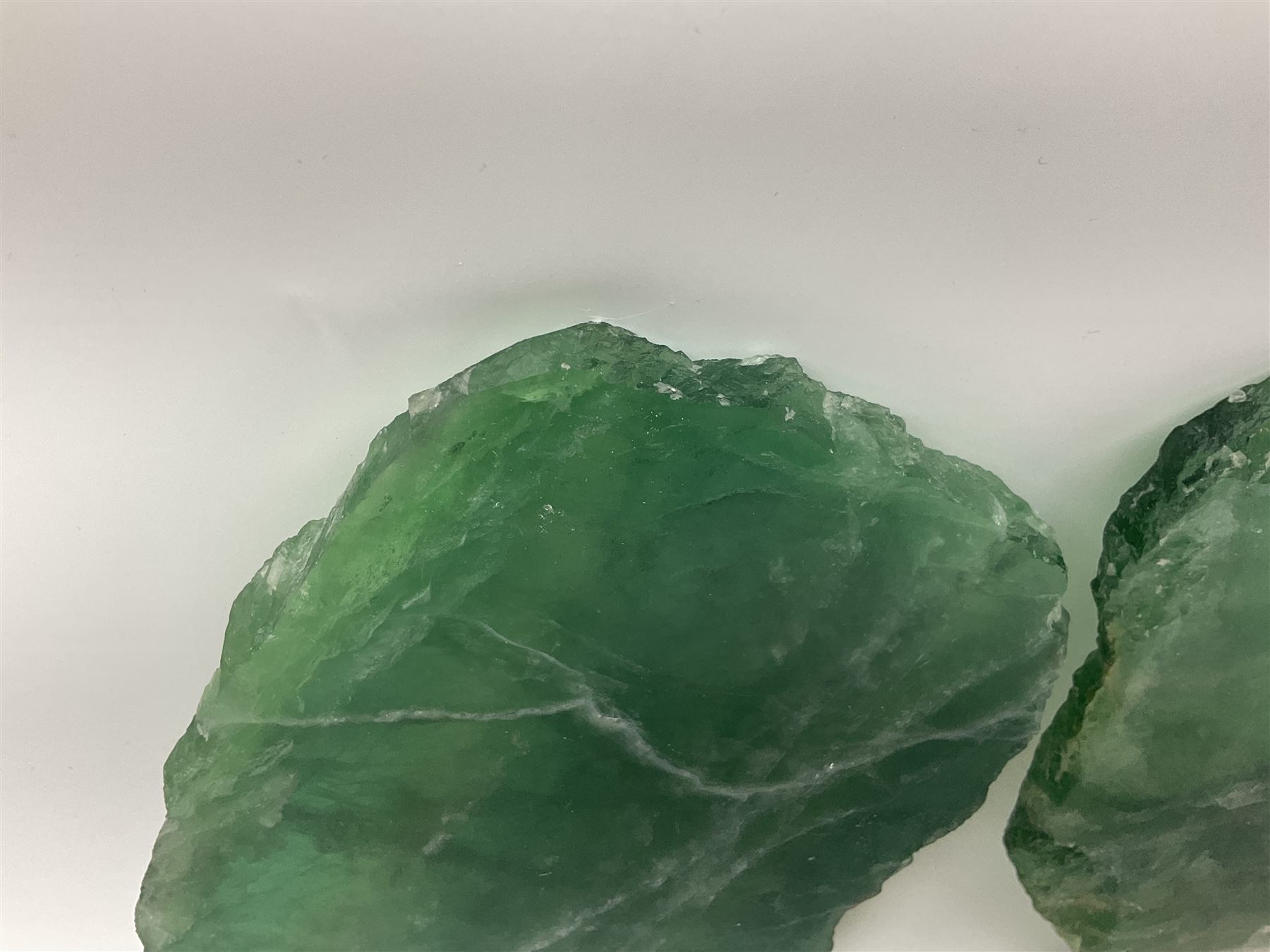 Pair of green fluorite slices, polished with rough edges, H16cm, L17cm  