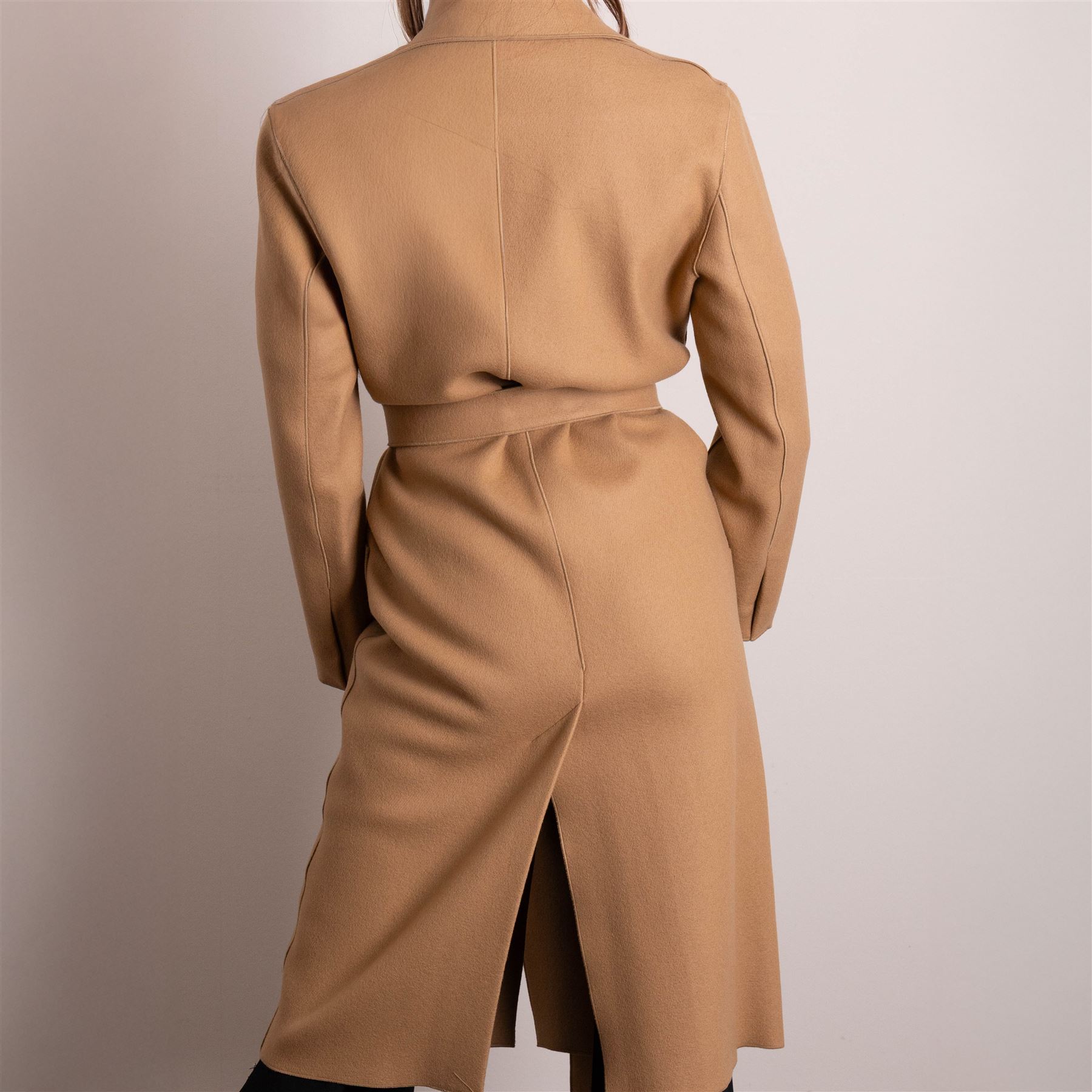 Amanda Wakeley London - full-length coat in camel wool, with notched lapels, concealed front fastening, self-tie belt, and side slip pockets, of minimalist tailored form, from the 'Petite Chic' line, unused