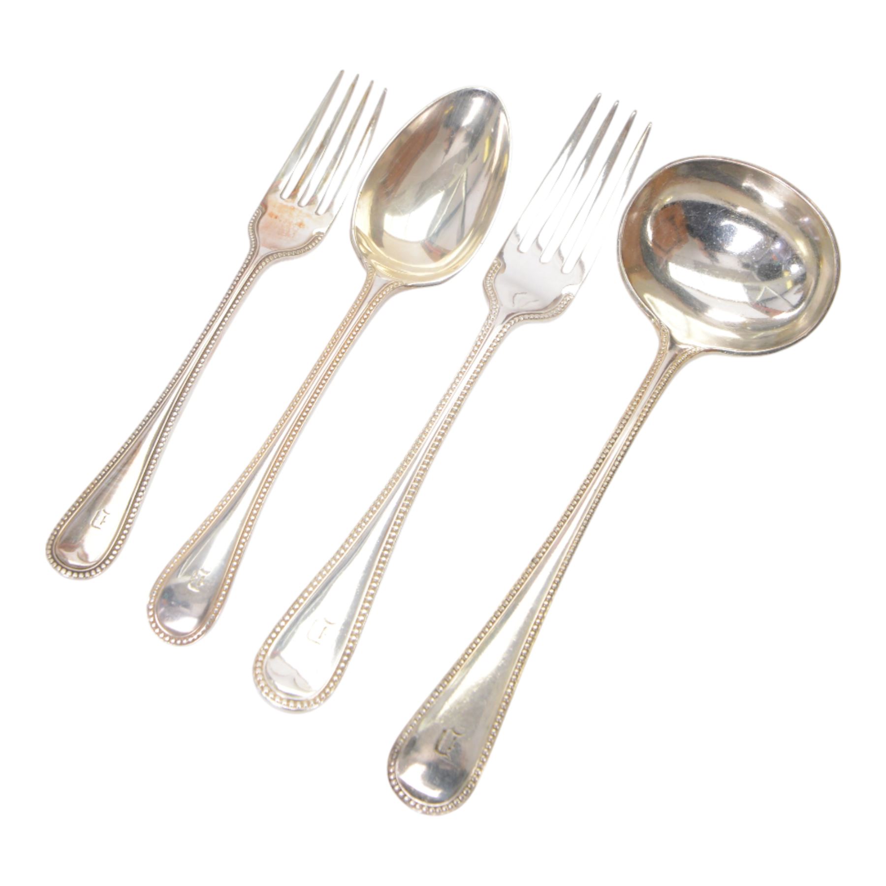 Oak table top canteen cabinet, the top with inset vacant brass cartouche, with pair of panelled doors opening to reveal four interior drawers with inset brass handle, containing a selection of silver plated flatware, 29cm x 40cm x 51cm