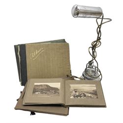 Quantity of post cards in six albums, local interest and photographic postcards, together with an art deco style table lamp