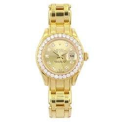 Rolex Oyster Perpetual Datejust Pearlmaster ladies 18ct gold automatic wristwatch, Ref. 69298, Serial No. T293223, champagne dial with diamond hour markers and diamond set bezel, on original 18ct Pearlmaster bracelet with fold-over clasp, with papers