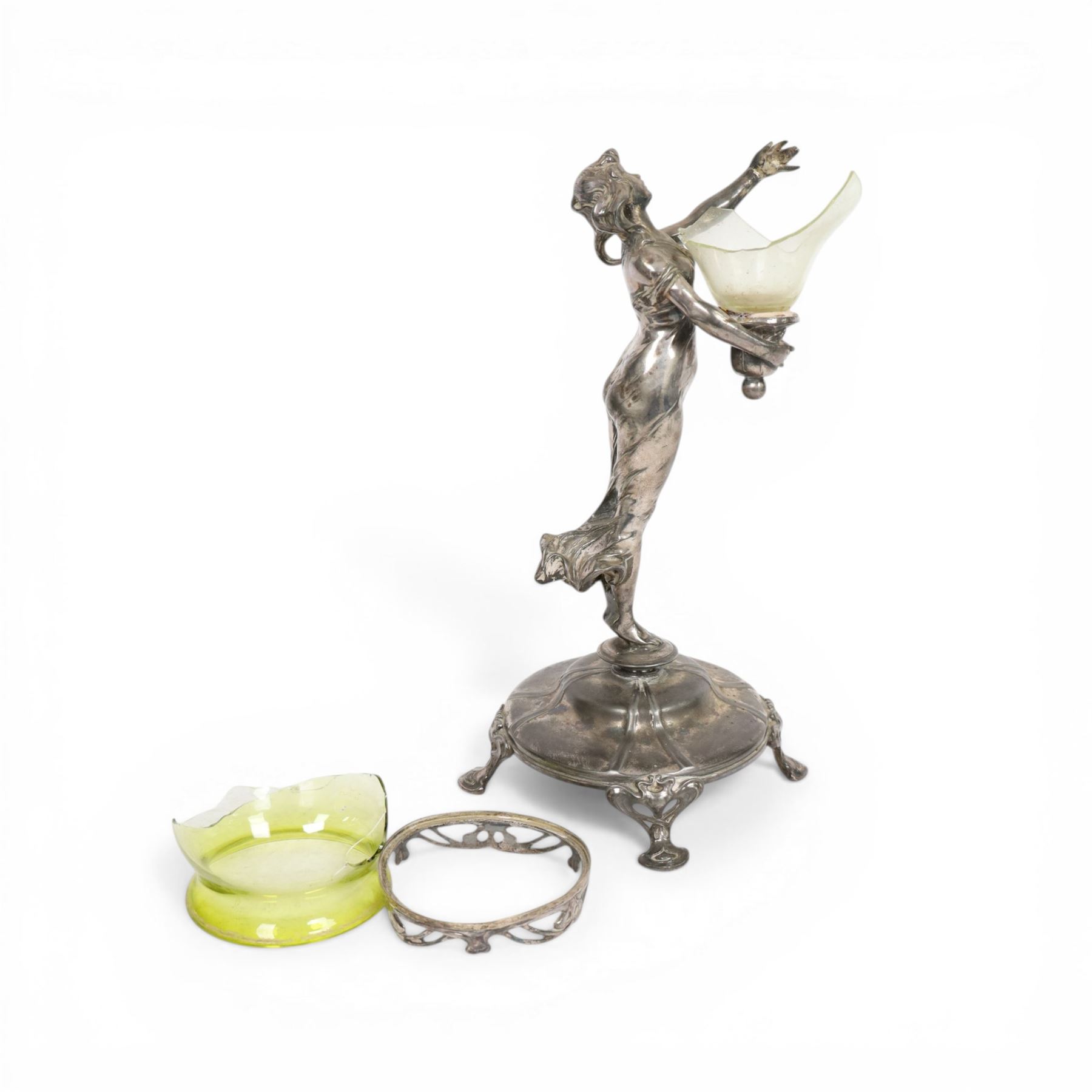 Art Nouveau pewter centre piece, modelled as a female figure upon a circular base raised  on four whiplash feet (a/f),  H28cm 