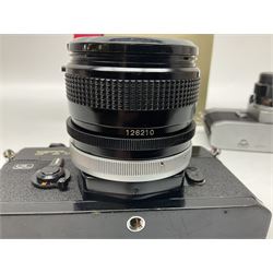 Canon FTb camera body, serial no. 715838, with 'Canon FD 50mm 1:1.8' lens, serial no. 207888, in original box, together with Canon FTb camera body, serial no. 557817, with 'Canon FD 35mm 1:3.5 S.C' lens, serial no. 126210 and Canon EX Auto camera body, serial no. 296244 with 'Canon EX 50mm 1:1.8' lens, serial no. 380869  