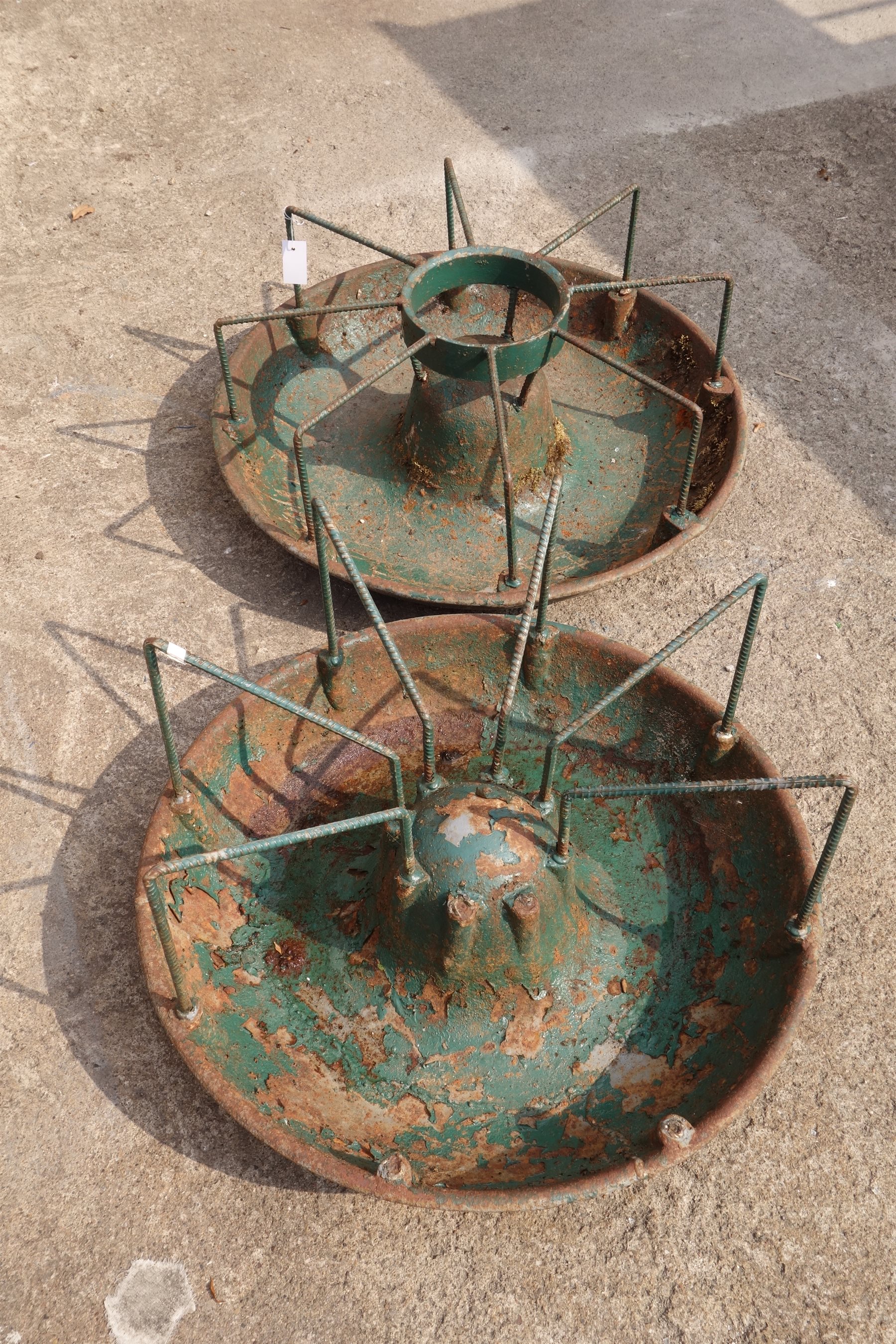 Pair green painted wrought metal Mexican hat pig feeders Garden