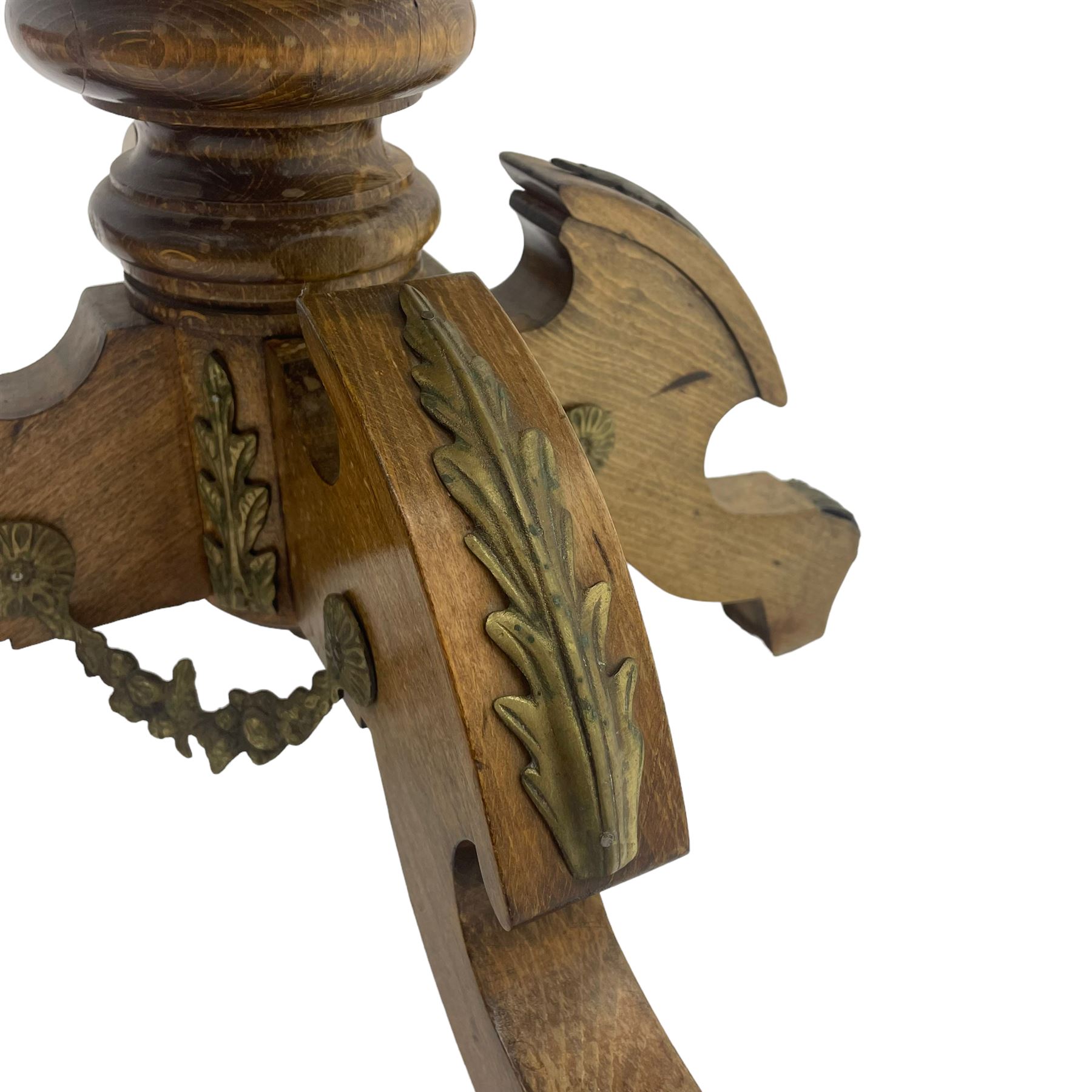 Mid-20th century figured walnut Italian design centre table, octagonal quarter veneered top with cross banding and moulded edge, the skirt decorated with scrolling foliage gilt metal mounts, on turned pedestal mounted with gilt acanthus leaves, quadruple splayed supports with further acanthus leaf decoration
