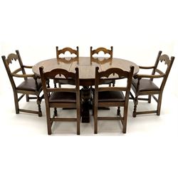 Mid to late century oak extending dining table four shaped supports on cup and cover column, four sledge feet (W165cm, H80cm, D114cm) and six (4+2) oak dining chairs (W56cm)