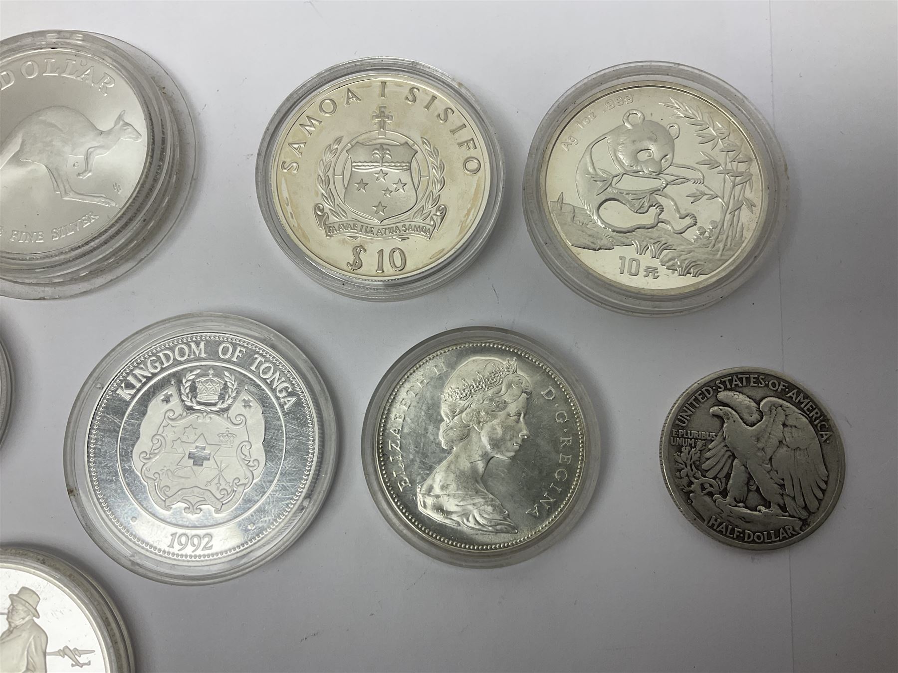 United States of America 1896 Morgan one dollar coin, 1893 'Columbian Exposition' commemorative half dollar, 1945 standing Liberty half dollar, Queen Elizabeth II Australia 1993 one ounce fine silver dollar, Canada 1967 and 1995 one dollar coins etc (15)