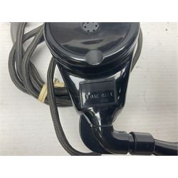 Collection of phone headsets, including GPO bakelite examples, together with other telephone parts 