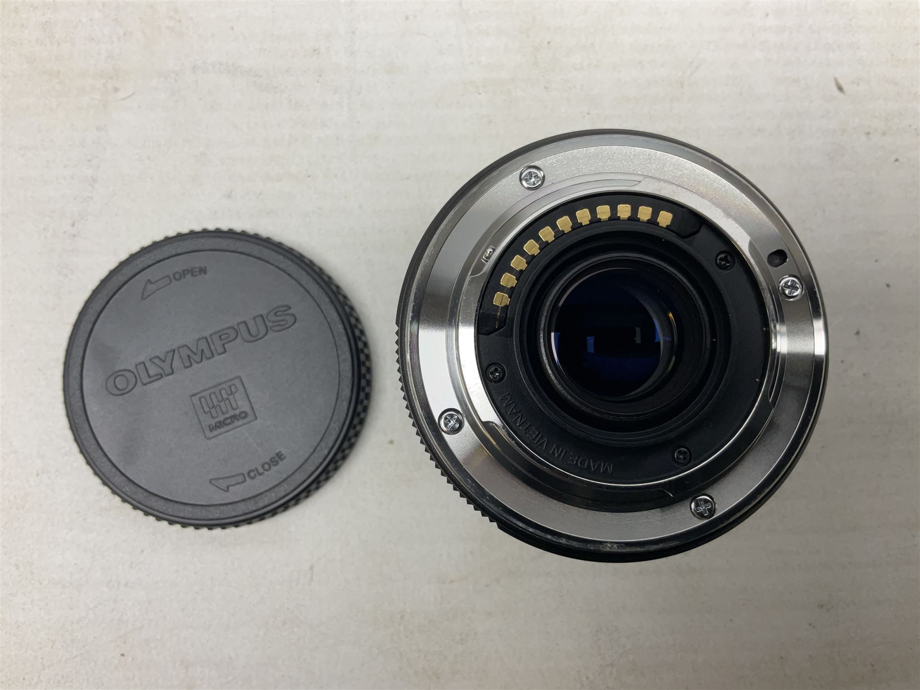 Olympus PEN-F camera body, with 'Olympus M- Zuiko Digital 25mm 1: 1.8' lens,  'Olympus M- Zuiko Digital 75-300mm 1: 4.8 - 6.7' lens and  'Olympus M- Zuiko Digital 17mm 1: 1.8' lens, with original box, together with Lowepro camera bag