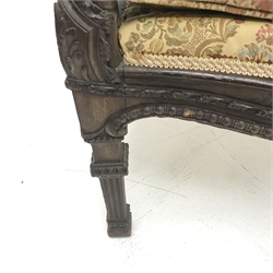  Early 20th century French walnut framed armchair with carved curving back, serpentine seat, four fluted square tapering supports, W74cm  