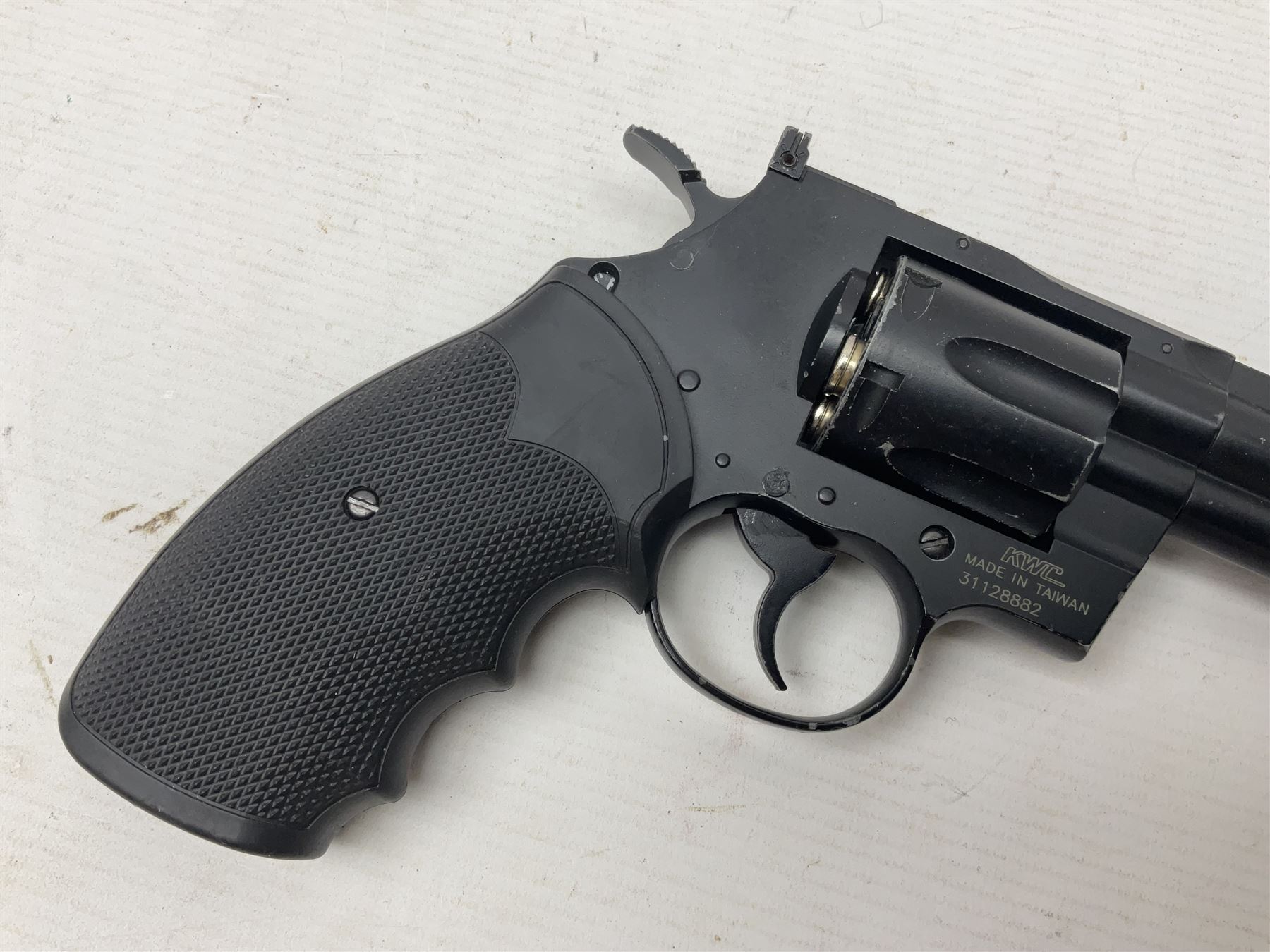 Marksman 1018 spring action BB pistol, serial no.121912951321, L27cm in original packaging with ball dispenser; and KWC .177 cal. CO2 revolver, serial no.31128882, L31cm (2)  NB: AGE RESTRICTIONS APPLY TO THE PURCHASE OF AIR WEAPONS.