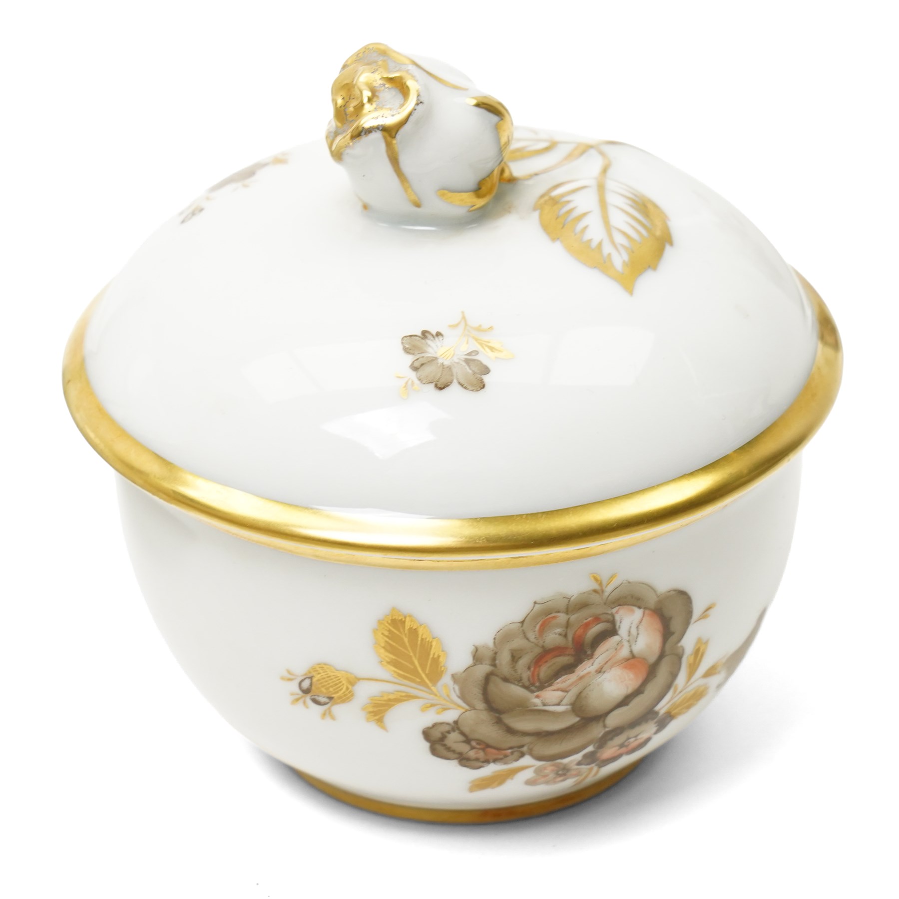 Furstenberg tea service decorated with sprays of flowers within a gilt rim comprising twelve cups and saucers, twelve plates, tea pot, hot water jug, milk jug, sugar bowl and cover and cake plate