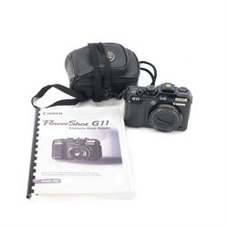 Canon PowerShot G11 digital camera serial no. 9015106423, in a soft shell case with user guide