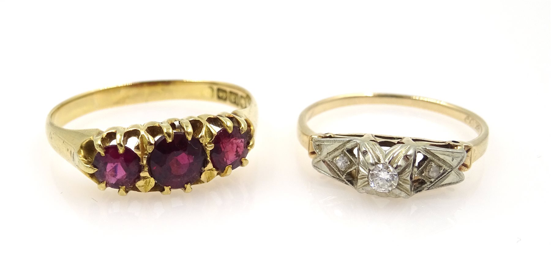 Gold three stone garnet ring, hallmarked 18ct and a gold three stone ...