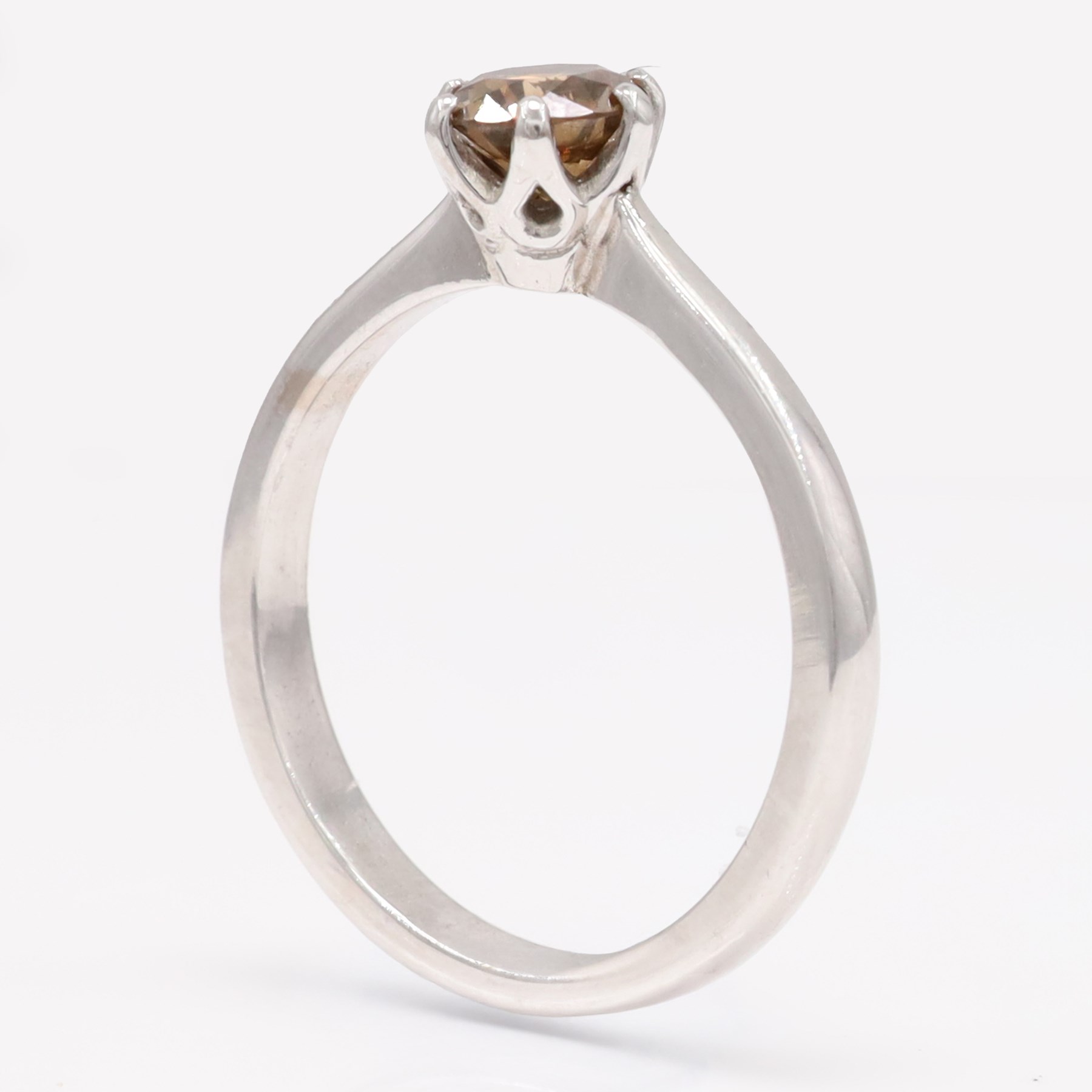 18ct white gold fancy brown diamond ring, six claw set with a round brilliant cut diamond of approx 0.80 carat, hallmarked