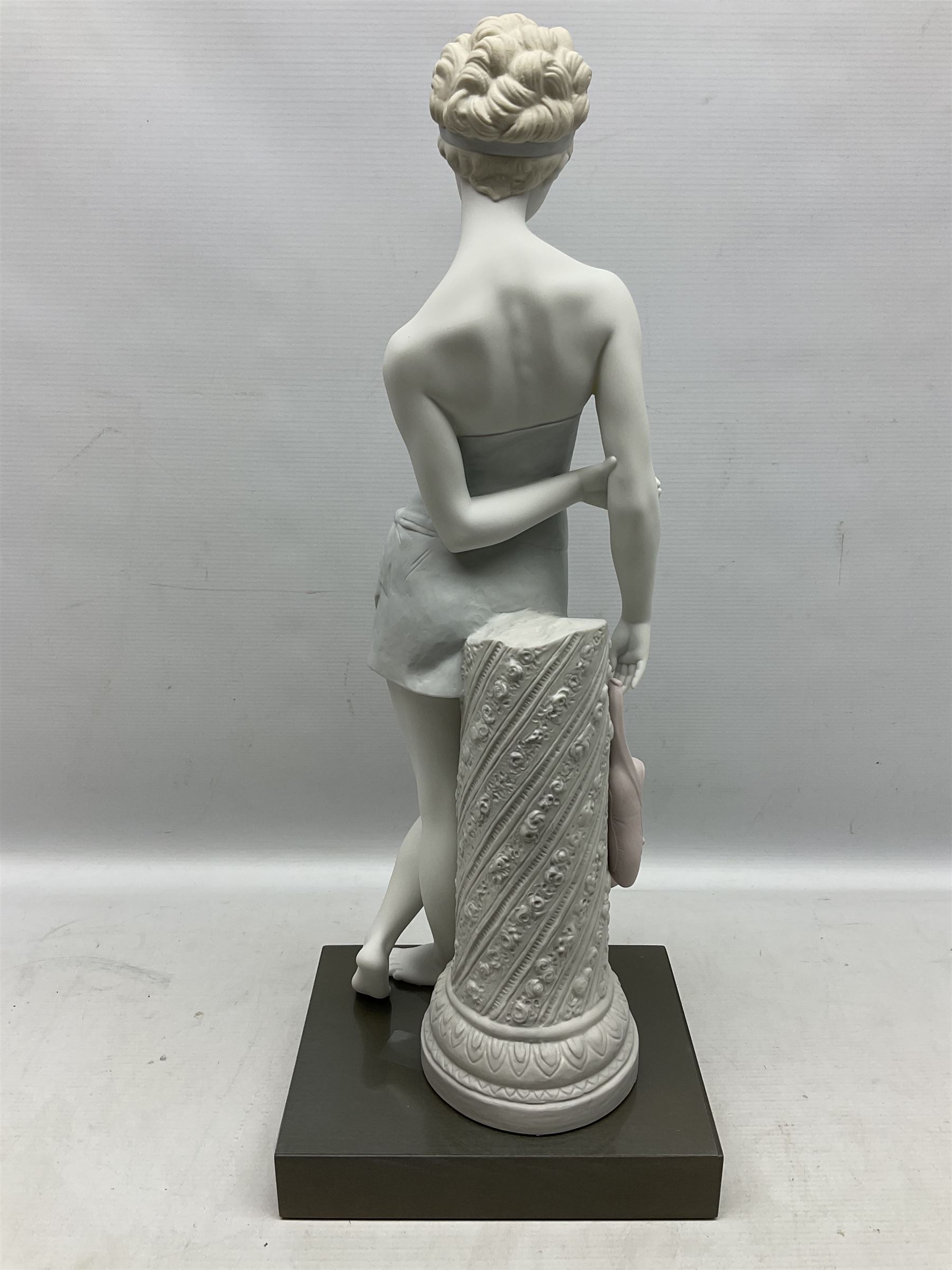Lladro Privilege figure, Dreams of a Ballerina, modelled as a ballerina leaning against a pillar holding her ballet shoes, limited edition 396/1000, sculpted by Jose Puche, no 1889, with original box, year issued 2003, yea retired 2004, H52cm 