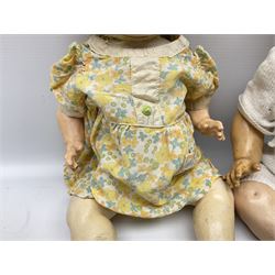 Carl Harmus Germany bisque head doll with applied hair, sleeping eyes, open mouth with teeth and composition body with jointed limbs; marked 'Harmus 313.4/0 Germany' H38cm; and Alt, Beck & Gottschalk Germany bisque head doll with applied hair, fixed eyes, open mouth with tongue and composition body with jointed limbs H44cm (2)