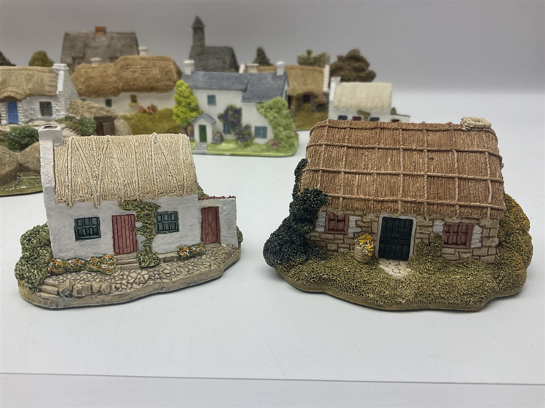 Sixteen Lilliput Lanes from the Irish Collection, to include Kilmore Quay, Causeway Cottage, Blarney Castle, Quite Cottage etc, all with boxes and deeds 