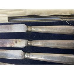 Edwardian cased set of six hallmarked silver handled butter knives, together with a further cased set of six 1920's butter knives, and a small group of assorted silver spoons, to include a pair of George III salt spoons