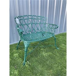 Cast iron green painted garden bench, two chairs, table and parasol - THIS LOT IS TO BE COLLECTED BY APPOINTMENT FROM DUGGLEBY STORAGE, GREAT HILL, EASTFIELD, SCARBOROUGH, YO11 3TX