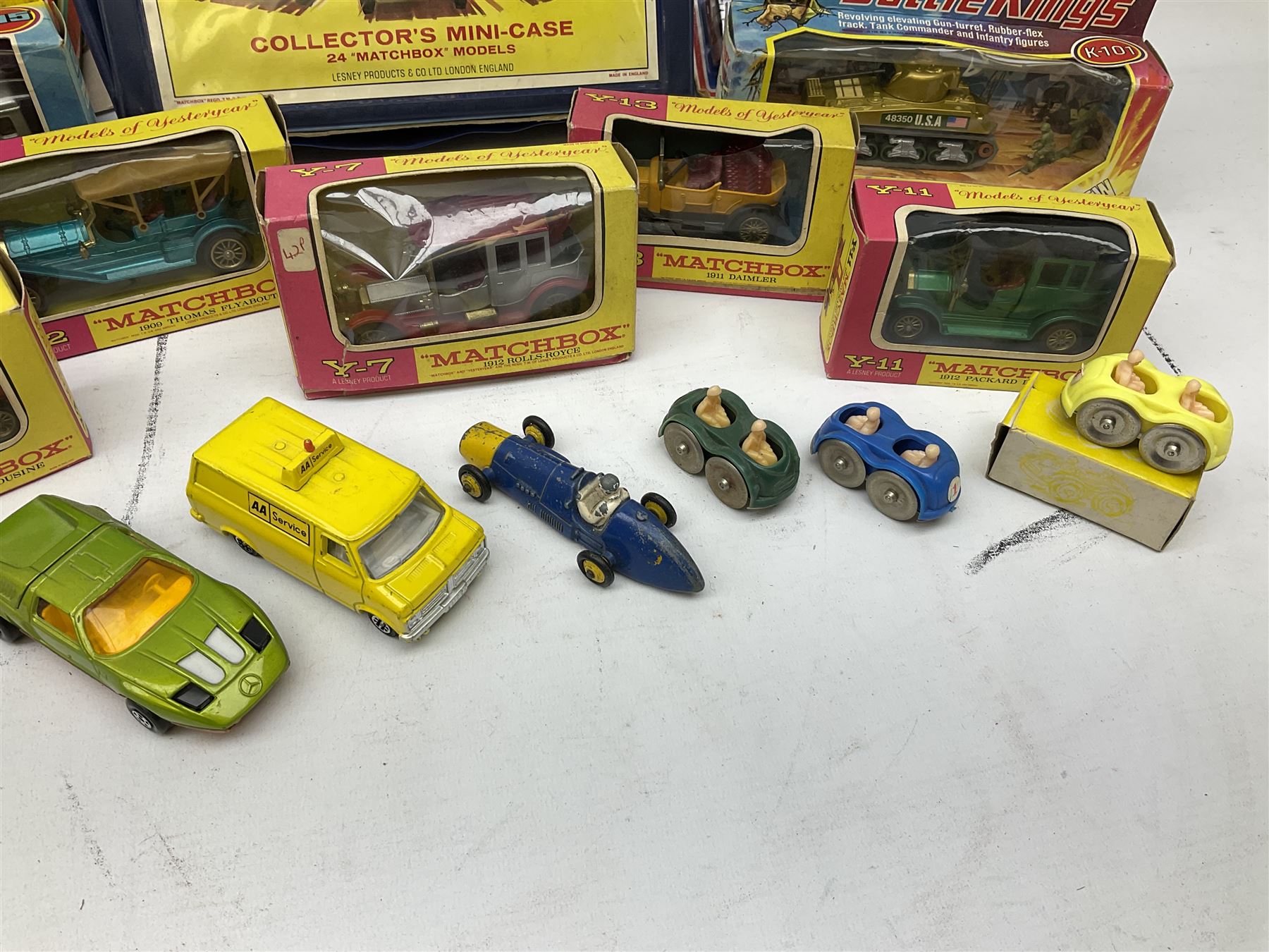 Matchbox - Collector's Mini-Case with twenty-three playworn models; five MOY models Y-3, Y-7, Y-11, Y-12 & Y-13; K101 Battle Kings Sherman Tank; K-15 Super Kings Jubilee Bus; all boxed; two blister packed Jubilee Buses; three 1970s Matchbox catalogues; Dinky Ferrari racing car; and other items