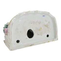 Late 19th/early 20th century Samson Paris porcelain figure group, modelled as a male and female figure seated upon a bench, with underglaze blue cross mark beneath, H25cm W24cm 