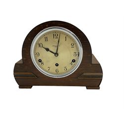 Westminster chiming mantle clock in an oak cases