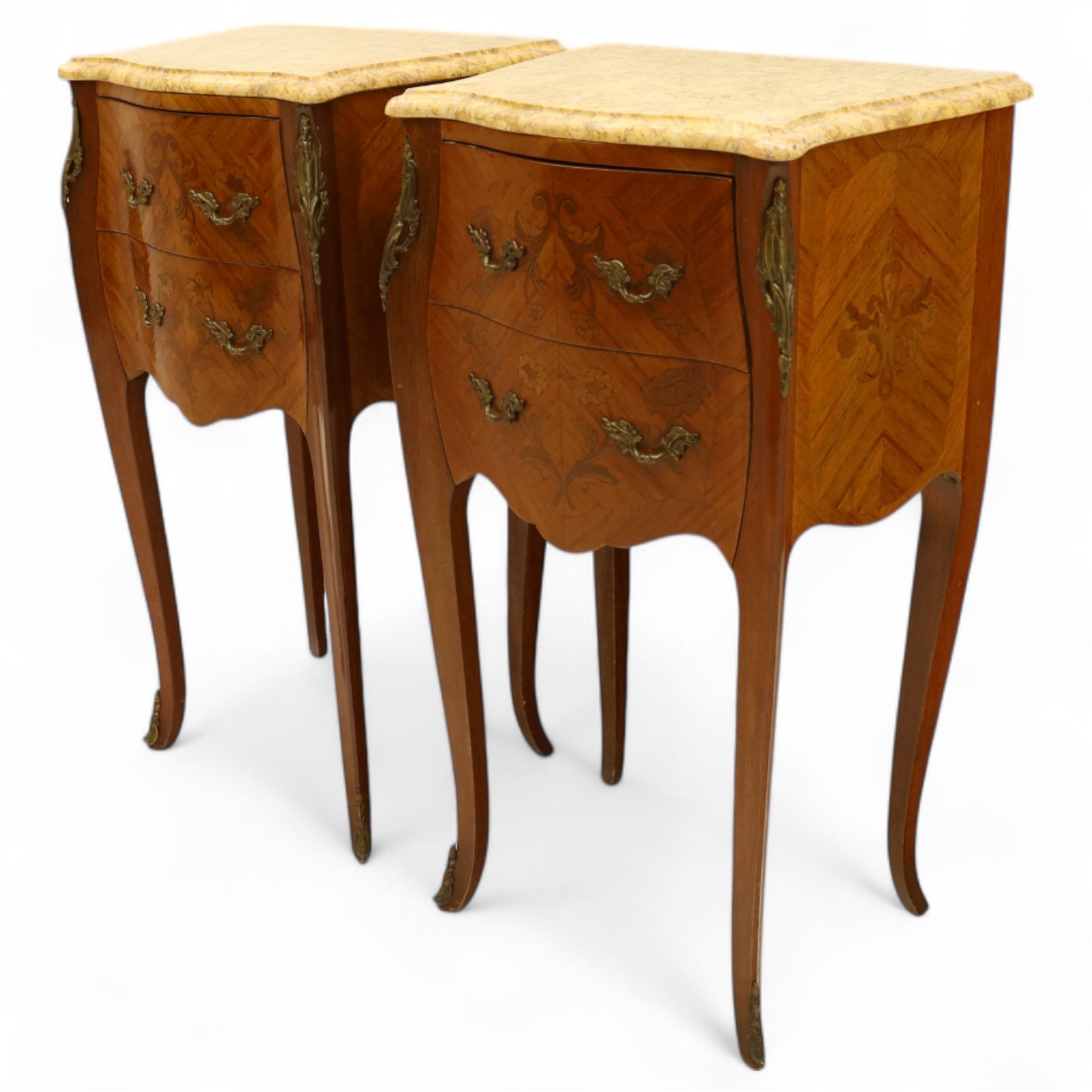 Pair of Louis XV style kingwood and marquetry bedside cabinets, the serpentine sienna marble top above two bombe fronted drawers with rococo style bronze handles and masks on slender cabriole legs terminating in bronze sabots  