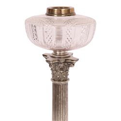 Victorian silver plated Corinthian column oil lamp, raised upon a stepped base, clear glass reservoir, H54cm 