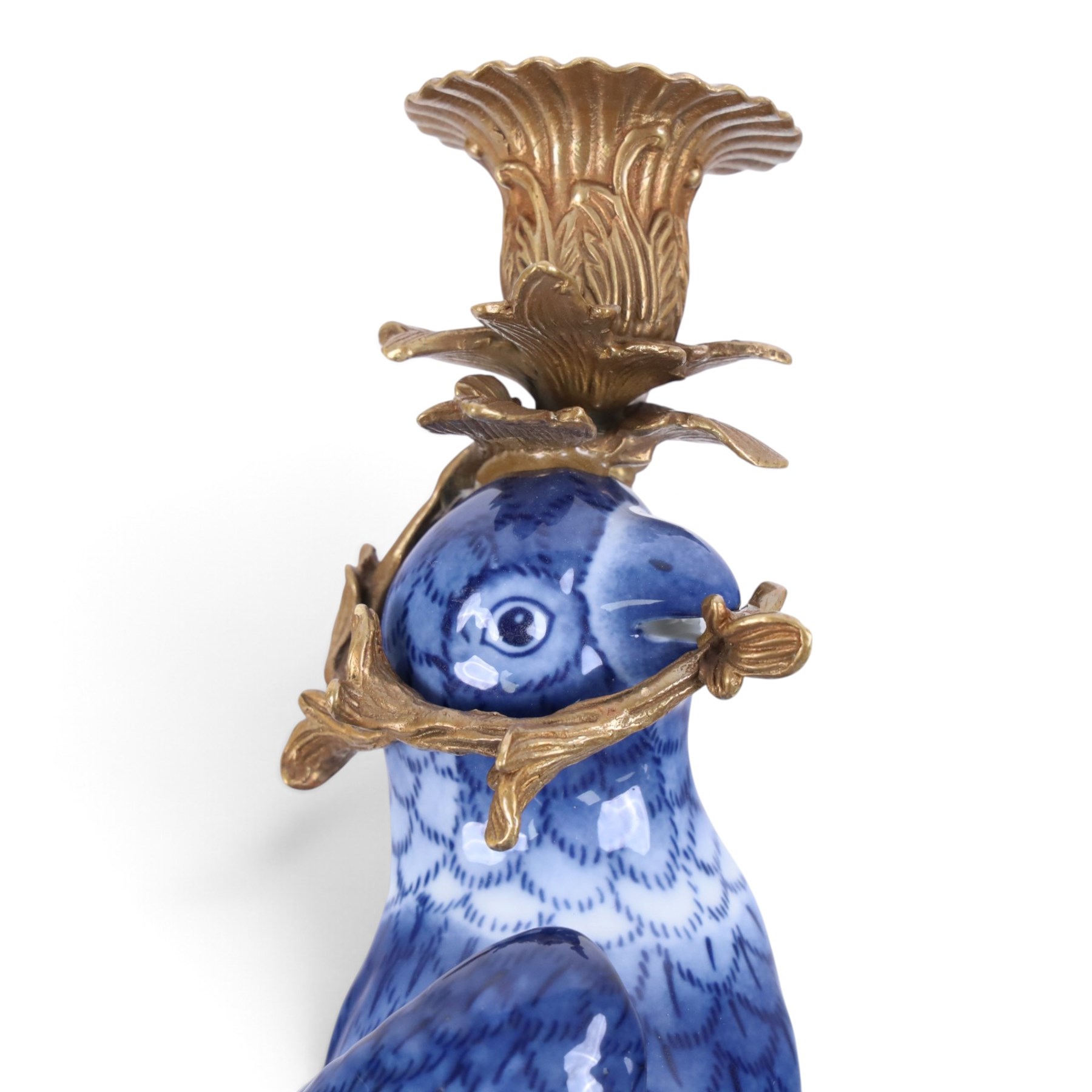 Pair of wall sconces, modelled as blue parrot upon a gilt branch, H47cm