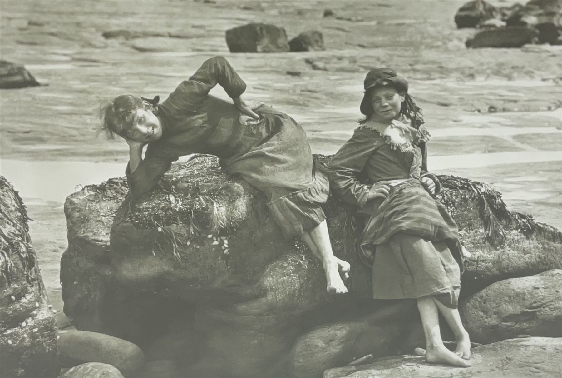 After Frank Meadow Sutcliffe (British 1853-1941): 'Pier Road Whitby' 'Limpets' & 'Dock End Whitby', three b & w prints 48cm x 64cm diminishing (3)