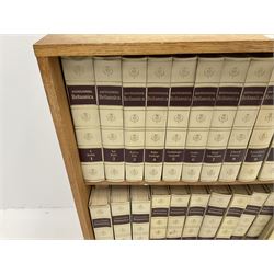 Light oak bookcase with Encylopedia Britania