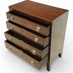 19th century Regency Revival inlaid mahogany chest, the plain rectangular top and frieze inlaid with geometric satinwood stringing, fitted with graduating long drawers fitted with pressed brass patera form handle-plates, on splayed feet with shaped apron