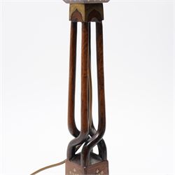 Early 20th century Arts and Crafts style Anglo-Indian table lamp, with open twist stem and gilt brass inlaid trailing vine and repeating arch pattern overall H53cm