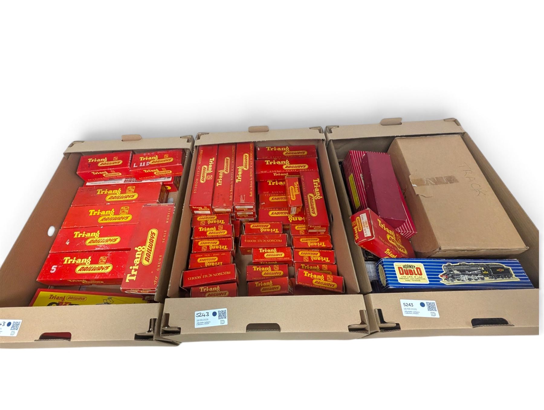 Collection of 00 gauge Hornby Dublo and Triang rolling stock, including one steam locomotive, two diesel shunters, breakdown crane, wagons, track and other accessories, mostly boxed, in three boxes