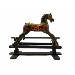Painted and carved wood rocking horse, on trestle base