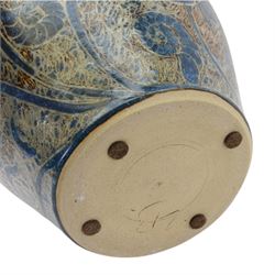 John Egerton (c1945-): studio pottery stoneware vase and cover, decorated with fish and ammonites upon a blue ground, H38cm