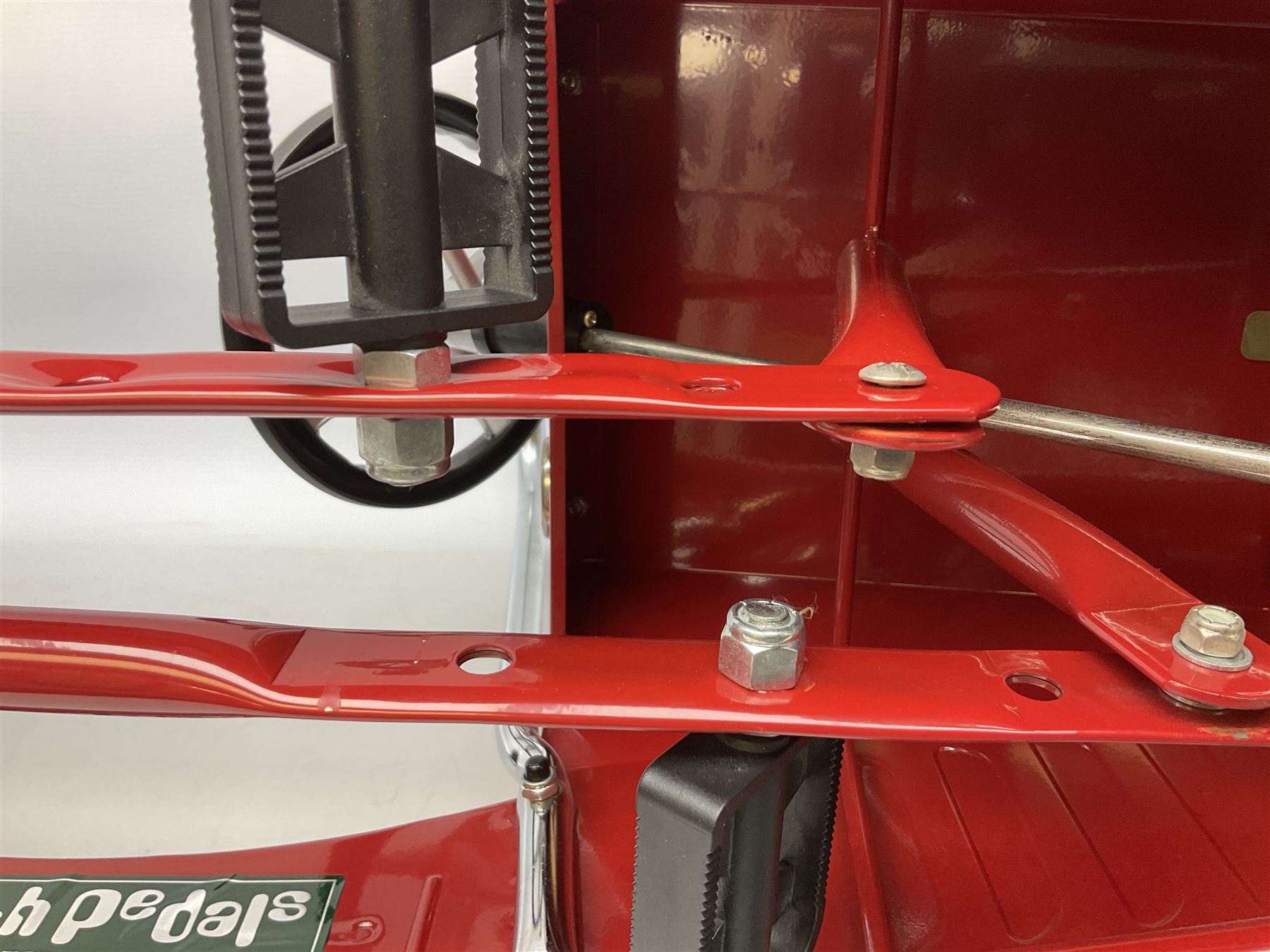 Red child's tin-plate pedal car with chrome detail, by Posh Paddles, Scarborough, H56cm, L80cm