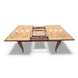 Barker and Stonehouse Flag Stone extending dining table and four matching chairs, the rectangular top with parquetry inlay and contrasting border, extending by central leaf, on slightly curved supports, the chairs with padded upholstered seats and ladder backs (Chairs H 108cm, W 50cm, D 54cm) (Extends to 195cm)