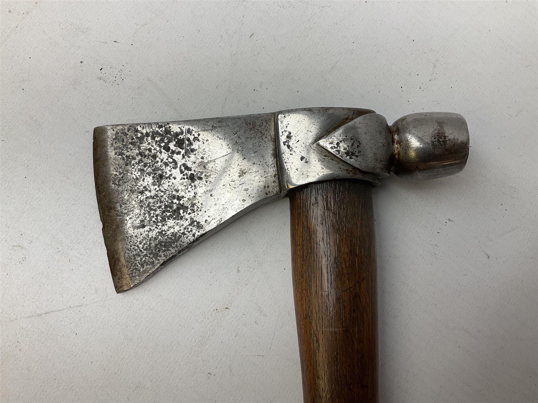 Early 20th century ceremonial Tomahawk pipe, steel axe head with pipe bowl, drilled drawing shaft, 46cm