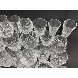 Set of Waterford Crystal Lismore pattern drinking glasses for six people, including hock glasses, goblets, champagne flutes,  sherry glasses, liqueur glasses, hi ball glasses, whisky glasses, brandy balloons, etc, all with etched maker's mark beneath  (62)