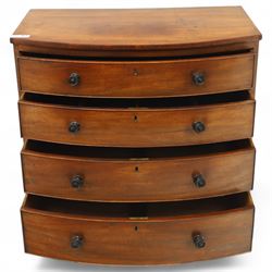 Mid-19th century mahogany bow front chest, fitted with four graduating drawers, turned ebonised handles, bun feet