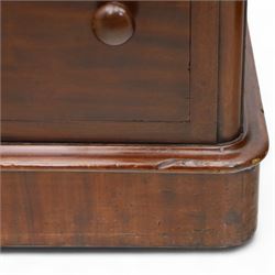 Pair of tall Victorian mahogany bedside chests, of narrow upright form, rectangular top with moulded edge, the back with raised pierced fretwork gallery, above four graduated drawers with knob handles, raised on a plinth base 