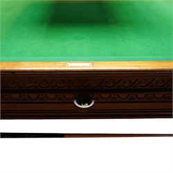 An outstanding bespoke late Victorian Aesthetic Movement golden oak full-sized snooker table of gothic influence, the rectangular slate bed covered in green baize within moulded rails and rounded pocket mounts, the protruding frame decorated with blind-fretwork frieze panels of Vitruvian scrolls and geometric ornament, over rails of repeating roundel carvings, raised on square chamfered and reeded supports with carved detail and panelled reserves, with further stylised brackets, stamped to the underside on all four edges R Anderson, serial number 4337
Viewing in situ near Tadcaster, please contact Chloe to arrange - 01904 393300