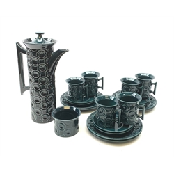 A Portmeirion coffee set, designed by Susan Williams Ellis, comprising coffee pot, six coffee cans and six saucers, six side plates, and an open sucrier, each with a teal ground decorated with roundels. 