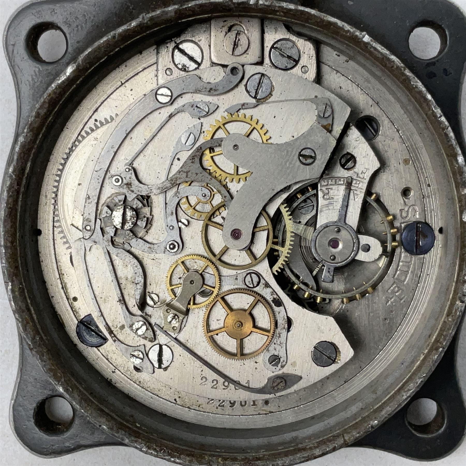 WW2 Jungans Luftwaffe aircraft cockpit clock with luminous centre sweep seconds hand, baton hour and minute hands, regulation 45mm black dial with date recorder, formerly illuminous Arabic numbers and minute track, rotating bezel (seized), going barrel movement with a lever escapement serial No 22901 jewelled to the centre wheel, over-sprung balance with timing  screws, max.H8cm